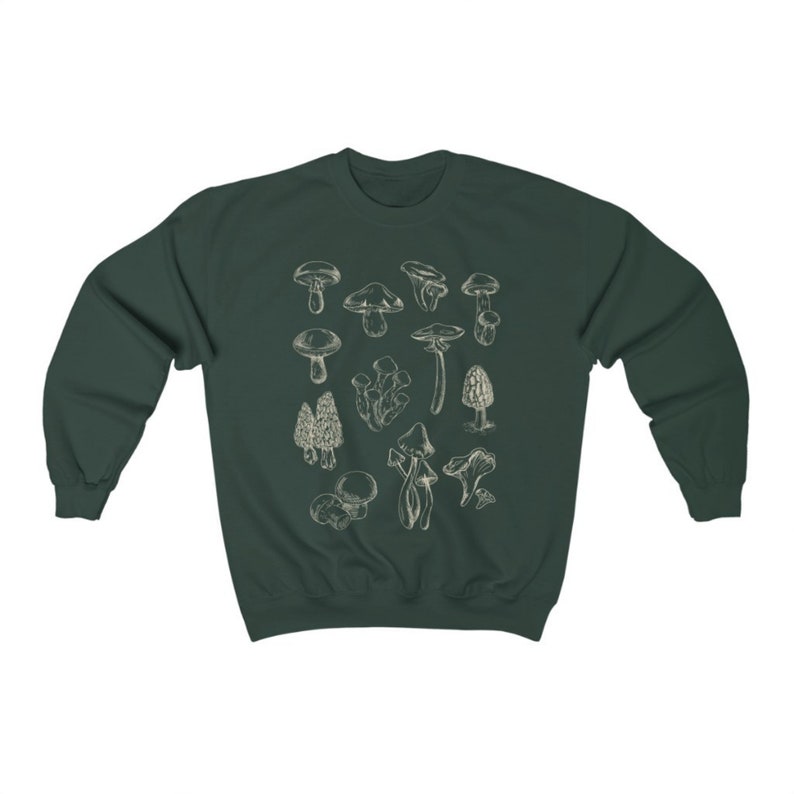 May include: A dark green sweatshirt with a white outline of various types of mushrooms printed on the front.