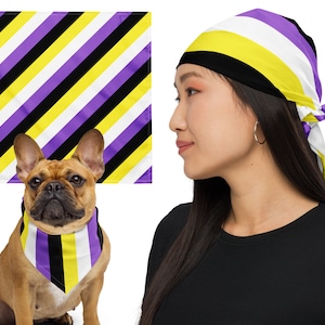 May include: Non-binary pride flag-themed bandana and headscarf. The bandana is worn by a French Bulldog and the headscarf is worn by a person. Both items feature diagonal stripes in yellow, white, purple, and black.