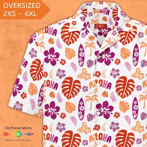 May include: White short-sleeved button-down shirt with a tropical print featuring hibiscus flowers, palm trees, surfboards, and the word "Aloha" in a red, orange, and pink color scheme.