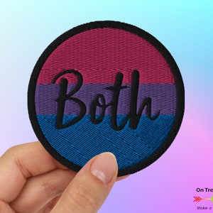 May include: A round embroidered patch with the bisexual pride flag colors: pink, purple, and blue. The word "Both" is embroidered in black cursive lettering on the patch.