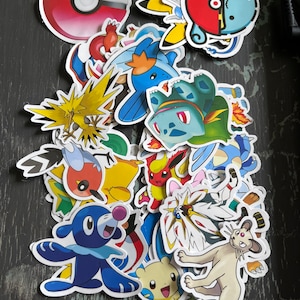 Stickers Pokémon 15 stickers aléatoires avec livraison gratuite Noël de dernière minute - nouveautés - cartes pokemon - tableau des récompenses