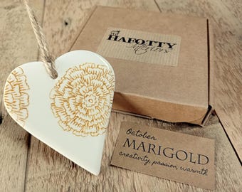 Birth flower hand-crafted ceramic hanging heart keepsake - with symbolism slip. Letterbox gift.
