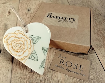 Birth flower hand-crafted ceramic hanging heart keepsake - with symbolism slip. Letterbox gift.