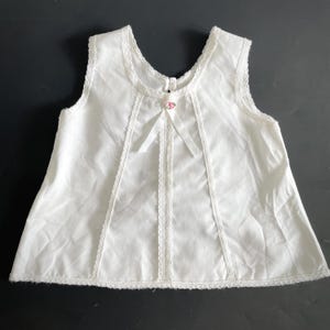 Vintage white sleeveless baby girl dress 14 months.