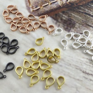 Castone a forma di pera. Castone a goccia cava per gioielli fai da te in resina. Piccoli ciondoli a forma di pera per bracciali e collane. Gioielli a forma di semi di senape