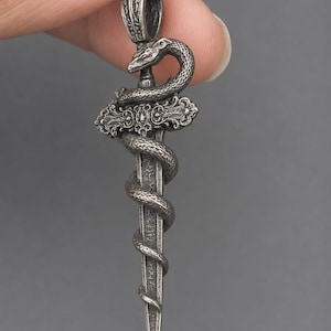 Snake Wrapped Dagger Pendant in Oxidized Silver-Plated Brass, Gothic Serpent Charm for Necklace Making