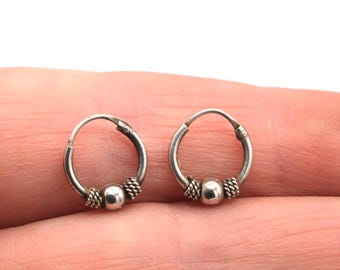 1990's Tiny Sterling Silver Hoops .39"