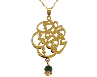May include: A gold necklace with a pendant featuring a delicate, intricate design. The pendant has a small, green stone with a clear crystal accent hanging from it.