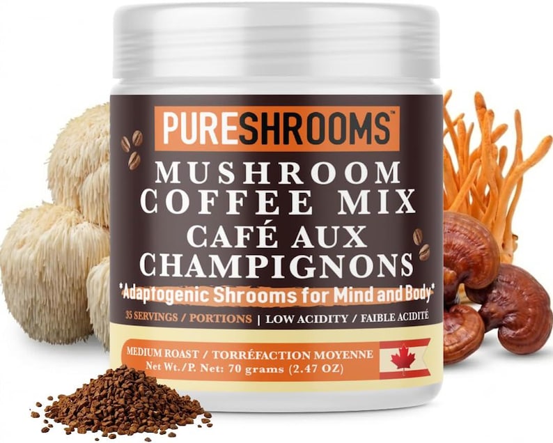 May include: A white jar of PureShrooms Mushroom Coffee Mix with the text "Caf&eacute; aux Champignons". The jar is surrounded by various mushrooms and a pile of coffee grounds. The label indicates 70 grams (2.47 oz) of product.