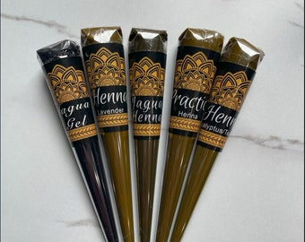 May include: Five henna cones with different labels. The cones are brown and black with gold lettering. The labels include "Jagua Henna", "Henna Lavender", "Jagua Henna", "Practi Henna Herina", and "Practi Henna Eucalyptus Tea".