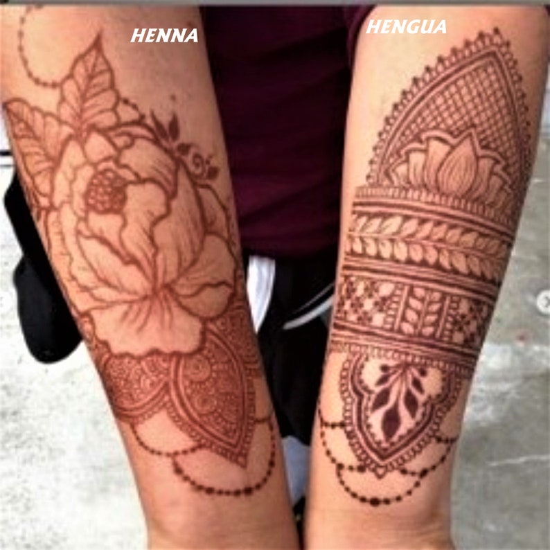 May include: Two arms with henna tattoos. The left arm has a large flower design with intricate details. The right arm has a geometric design with a lotus flower at the top.
