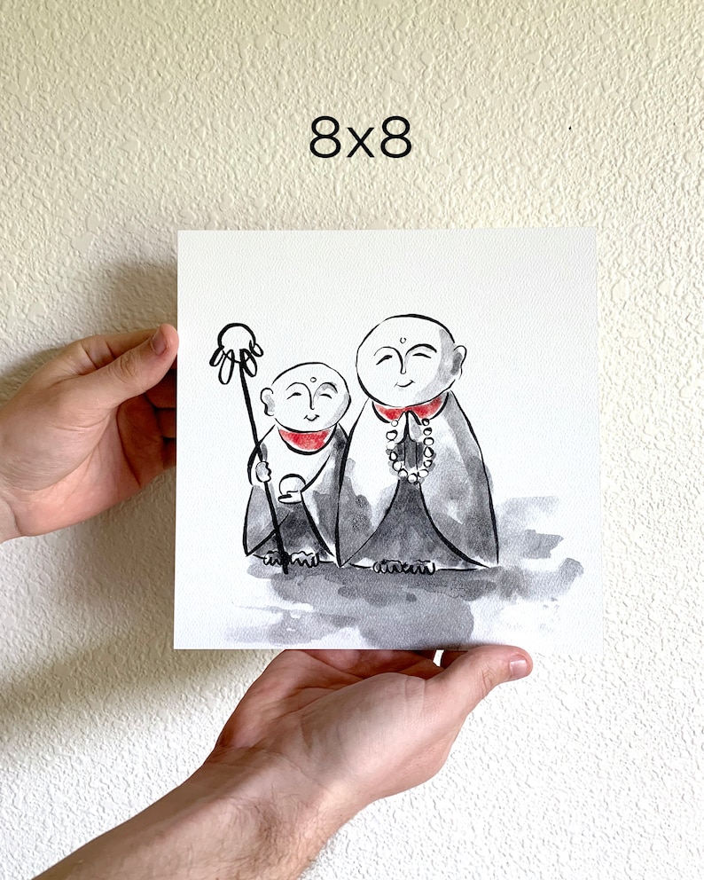 May include: Watercolor painting of two cartoon monks, one holding a staff with a hand at the top, the other holding prayer beads. The monks are wearing traditional robes and have a serene expression on their faces. The painting is on a white background.