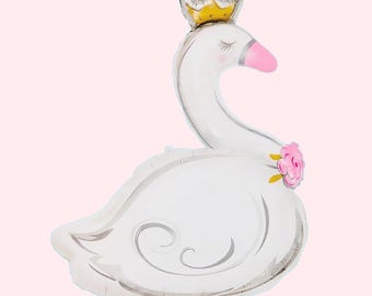 May include: A white swan balloon with a gold crown and a pink rose. The balloon has a silver swirl design and a pink beak.
