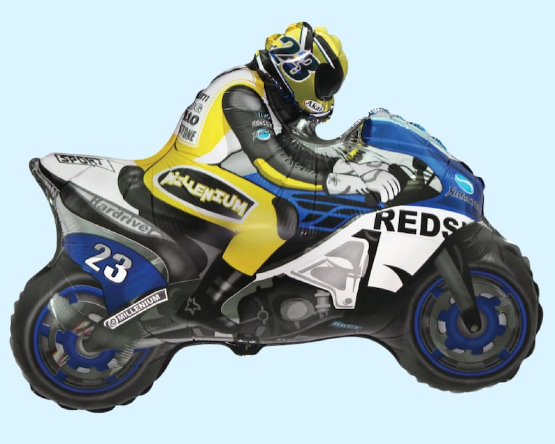 May include: A yellow, blue, and black foil balloon shaped like a motorcycle with a rider wearing a helmet. The motorcycle has the word "REDS" on the side and the number "23" on the front wheel.