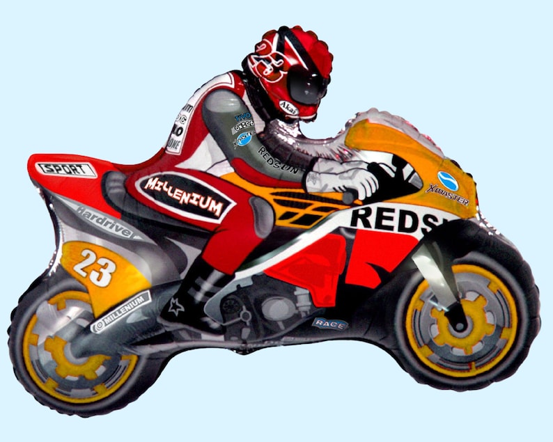 May include: A red, yellow, and black foil balloon shaped like a motorcycle with a rider wearing a red helmet. The motorcycle has the word "REDS" on the side and the number "23" on the back.