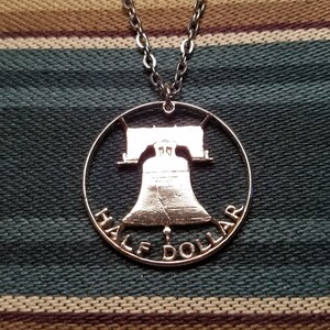 Hand Cut Liberty Bell Pendant: 90% Silver Half Dollar Coin Jewelry