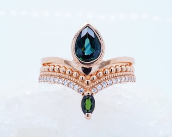 Teal Montana Sapphire Engagement Ring + Tsavorite Garnet and Moissanite Wedding Band