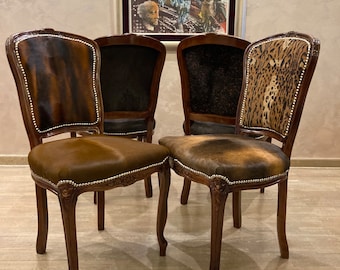 ¡Vendido! Sillas de comedor de piel de vaca. Estilo francés exclusivo. Juego combinable.
