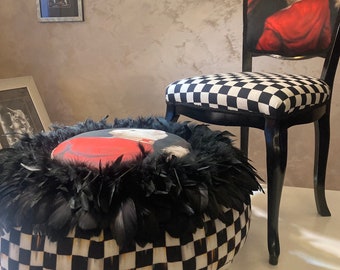 Checkered round ottoman with cat image. Eclectic pouf with feathers. Elegant conversation piece. Hand painted furniture. Unique whimsy stool