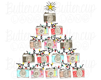 May include: A digital illustration of a Christmas tree shape formed by stacked cameras in various colors and patterns, including stripes and polka dots. A yellow star sits at the top, and black string lights with colorful bulbs wrap around.