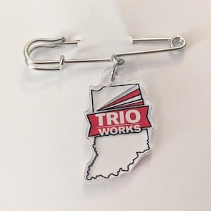 May include: A set of three ceramic mugs with a speckled, matte finish. The mugs are in shades of cream, light gray, and dark gray. Each mug has a simple, minimalist design and a rounded handle.