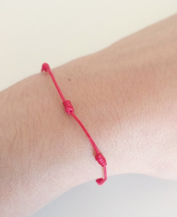 Pulsera roja protectora 7 nudos