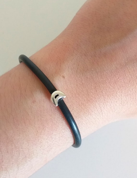Pulsera estrella y caucho