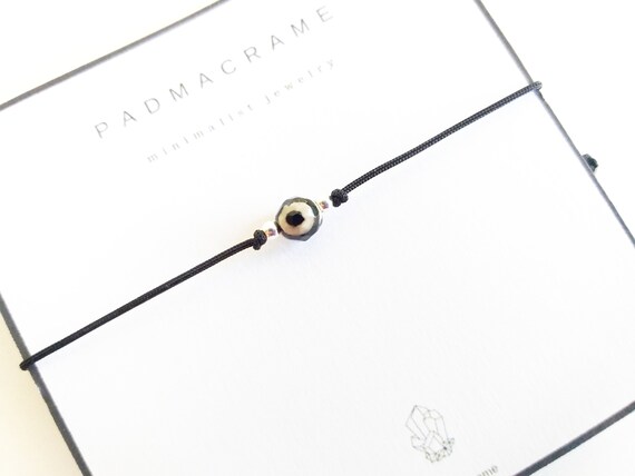 Pulsera dzi protectora redonda