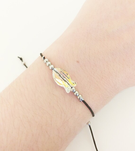Pulsera ajustable de acero y pez blanco de swarovski