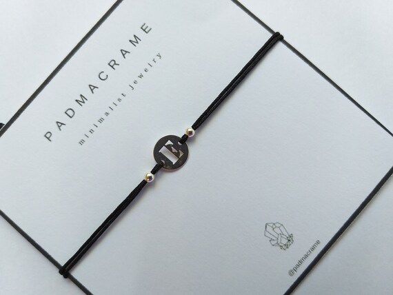 Pulsera inicial de plata de ley
