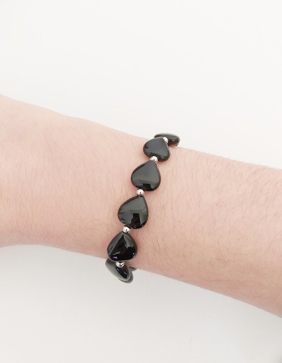 Pulsera protectora corazones de ónix