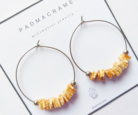 Pendientes de acero nothing hill