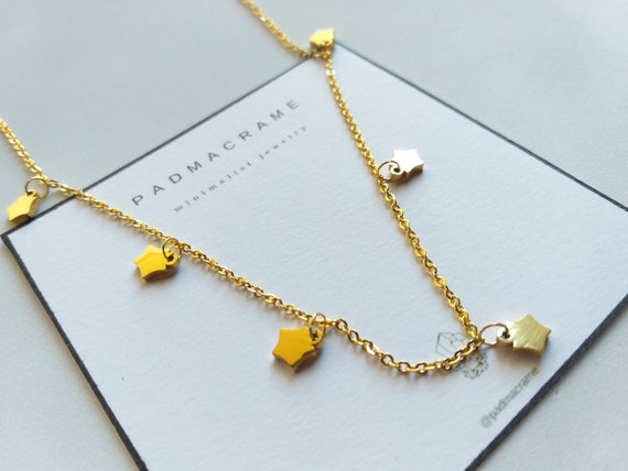 Collar estrellitas de acero dorado