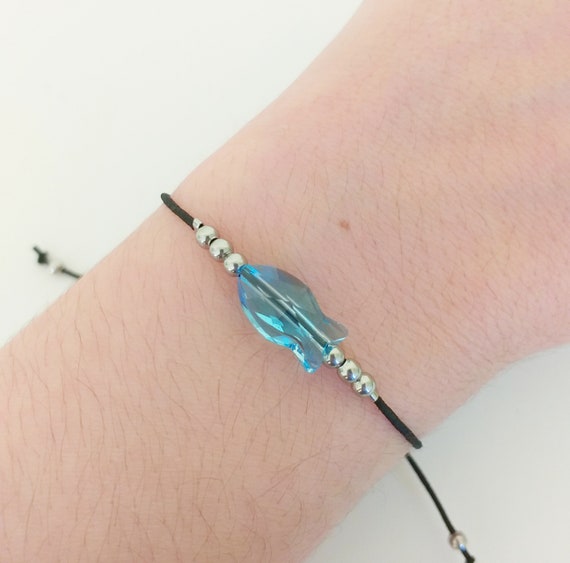 Pulsera ajustable de acero y pez azul de swarovski
