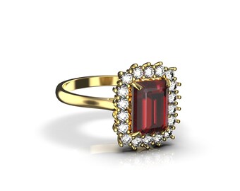 Anillo de rubí talla esmeralda y diamantes en oro de 14 quilates