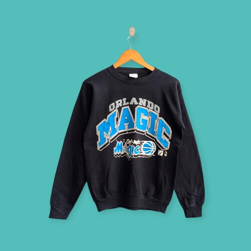 vintage des années 90 Orlando magic sweatshirt Orlando magic ras du cou Pull magique d'Orlando pull streewear couleur noire taille moyenne pour petite