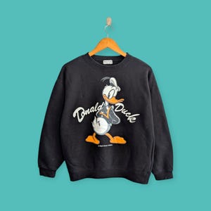 Vintage 90er Jahre Donald Duck großes Bild Sweatshirt Donald Duck Crewneck Donald Duck Pullover Pullover Cartoon-Stil schöne schwarze Farbe Größe Medium