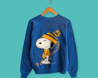 Sweat snoopy grande image vintage des années 80 et 90 graphiques mignons pull snoopy à col rond style streewear agréable couleur bleu taille moyenne