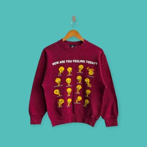 Sudadera vintage de los años 90 con la expresión de Tweety, cuello redondo, estilo urbano, color granate, talla pequeña.