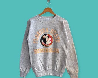 90年代のヴィンテージ、フロリダ州立大学のダメージ加工スウェットシャツ、フロリダ州立大学のクルーネックセーター、プルオーバー、素敵なグレーカラー、サイズM