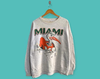 ヴィンテージ 90年代 マイアミ ハリケーンズ NCAA グリーン スウェット