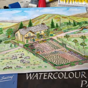 May include: Watercolor painting of a rural landscape featuring a house, garden, and sheep. The artwork is on a watercolor pad with the text "WATERCOLOUR PAD" and "Keep Smiling". The painting uses green, yellow, and brown hues.