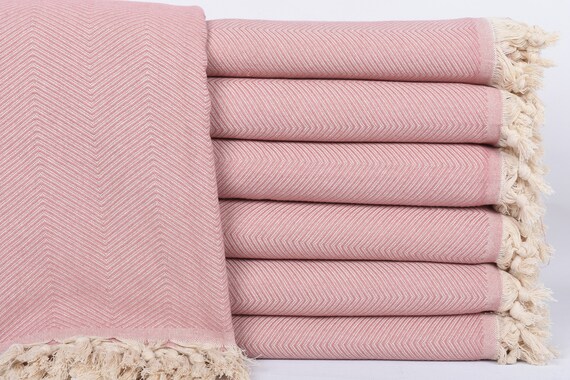 Powder pink throw sale