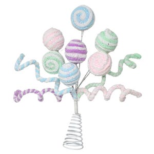 May include: A colorful tree topper featuring pastel-colored, glitter-covered swirl ornaments. The ornaments are in shades of pink, blue, green, and purple. The topper has a white spiral base and decorative swirled stems.