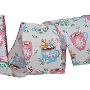 May include: A decorative ribbon featuring a repeating pattern of hot cocoa mugs, snowflakes, and gingerbread men on a light gray background. The mugs are in shades of pink, blue, and green, with the word "Joy" on some. The ribbon's edges are trimmed in pink.