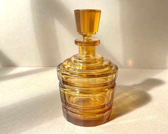 Vintage carafe, amber color, thick glass, cut diamond point, made in France, mid-20th century.