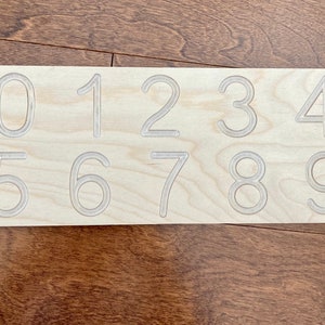 Wooden number tracing board