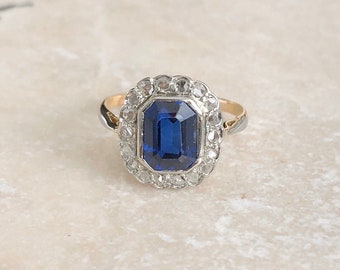 Art Deco 18 Carat Gold and Platinum Diamond and Blue Stone Ring