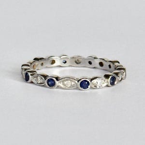 Vintage Platinum Sapphire and Solitaire Band
