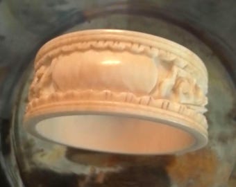 Antique Carved Chinese Bovine Bone Napkin Ring of a Dragon